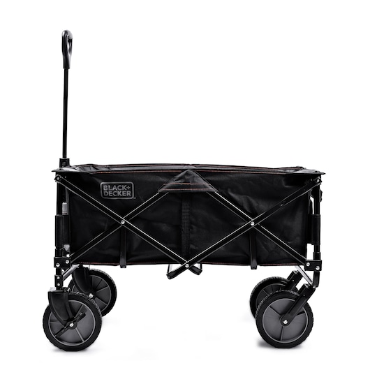 A BLACK+DECKER folding utility wagon with a black fabric body, sturdy metal frame, and four large wheels. The wagon features a handle for pulling and is designed for carrying items.