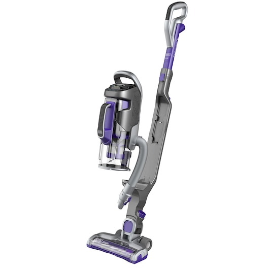 A BLACK+DECKER cordless stick vacuum cleaner in grey and purple, shown standing upright on a white background.
