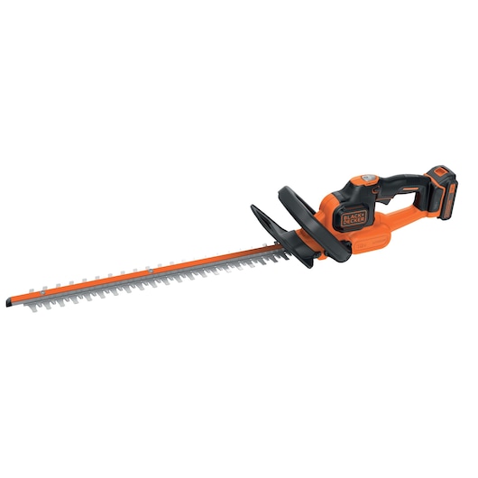 A cordless orange and black hedge trimmer with an ergonomic handle and long blade, designed for garden maintenance.